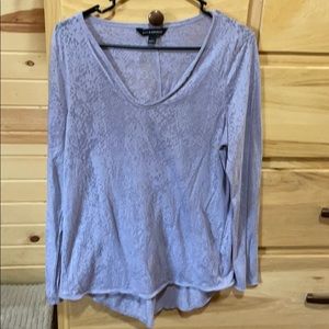 Sheer lavender top.